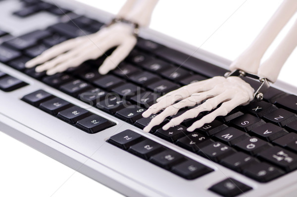 Skeleton working on the keyboard Stock photo © Elnur