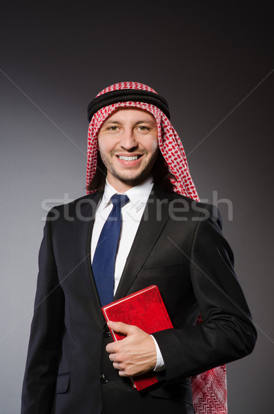 Arab man with book in diversity concept Stock photo © Elnur