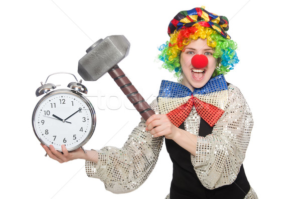 Female clown with alarm-clock and hammer isolated on white Stock photo © Elnur