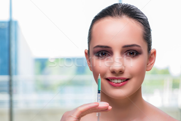 Beautiful woman preparing for botox injection Stock photo © Elnur