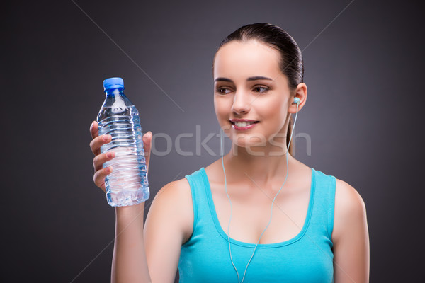 Femeie sport sticlă apa dulce apă muzică Imagine de stoc © Elnur