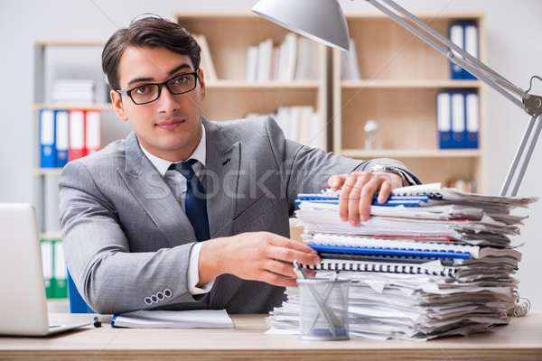Handsome businessman working in the office Stock photo © Elnur