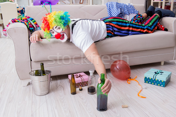 Drunk clown celebrating having a party at home Stock photo © Elnur