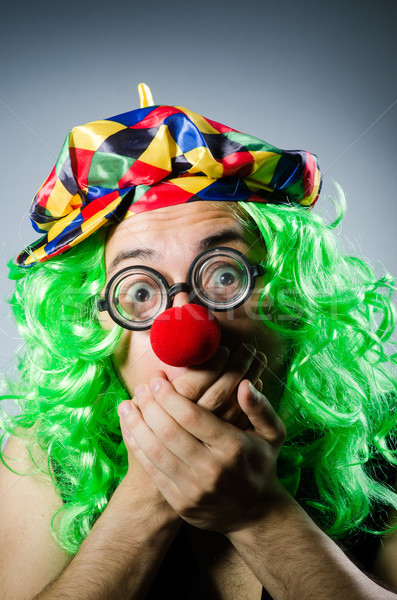 Funny clown against the dark background Stock photo © Elnur