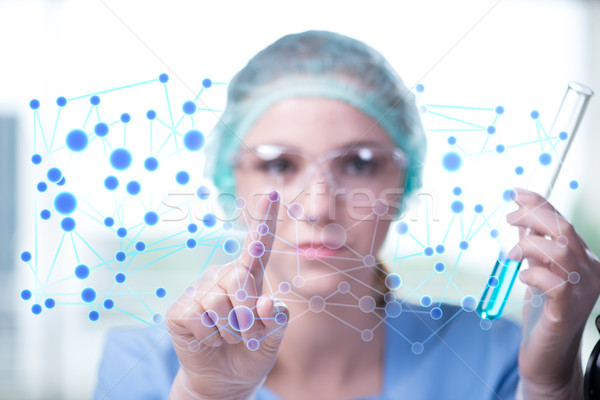 Young woman doctor pressing virtual buttons Stock photo © Elnur