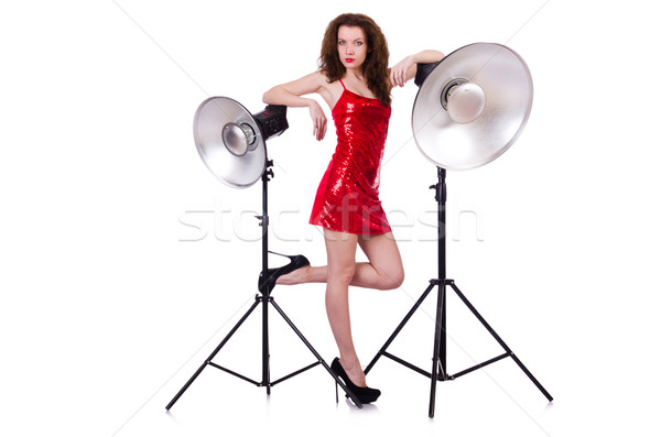 Woman in red dress posing in the studio Stock photo © Elnur