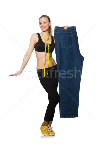 Jeune femme régime heureux fitness exercice jeans Photo stock © Elnur