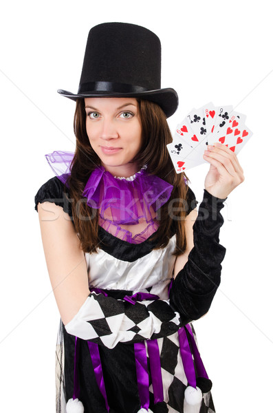Pretty girl in jester costume with cards isolated on white Stock photo © Elnur