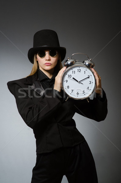 Woman with clock in business concept Stock photo © Elnur