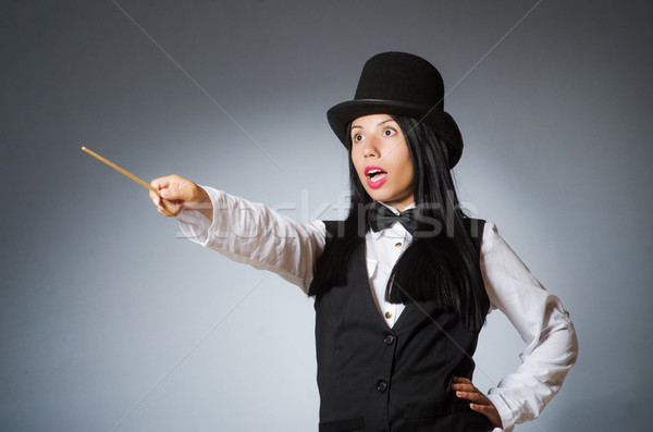 Femeie magician amuzant fată retro pălărie Imagine de stoc © Elnur