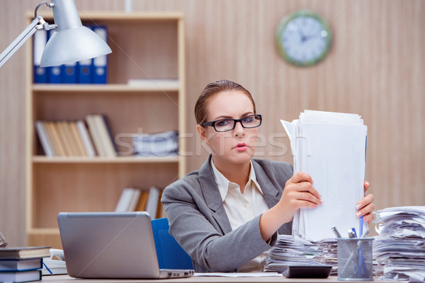 Busy stressful woman secretary under stress in the office Stock photo © Elnur