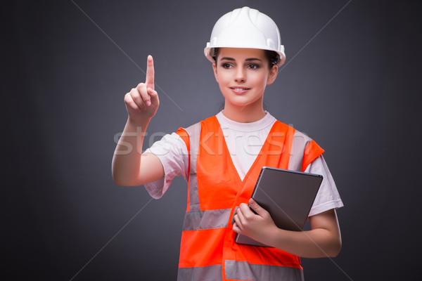 Young construction worker with tablet computer Stock photo © Elnur