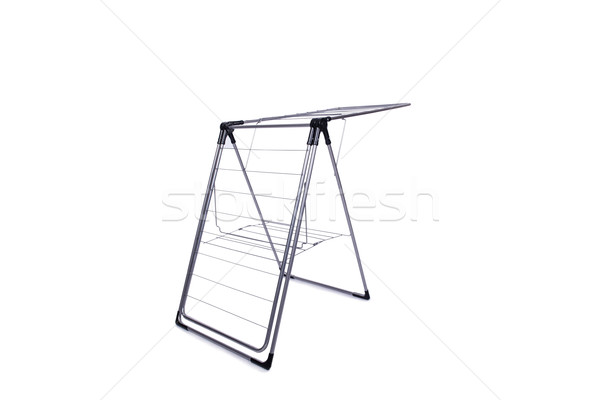 Stock photo: Collapsible clotheshorse isolated on the white background