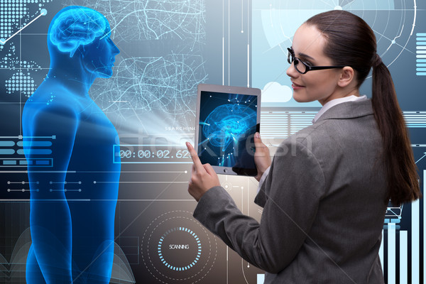 Futuristic remote diagnostics concept with businesswoman Stock photo © Elnur