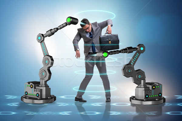 ビジネスマン 操作 ロボットの 腕 ビジネス 男 ストックフォト © Elnur