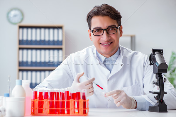 Young doctor with the syringe Stock photo © Elnur