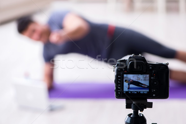 Sports and health blogger recording video in sport concept Stock photo © Elnur