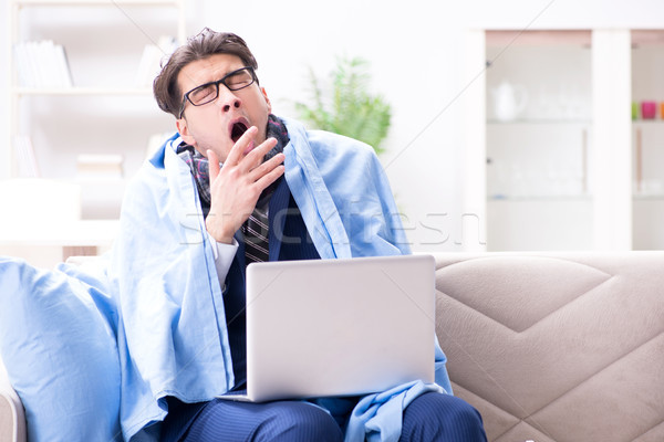 Sick businessman working from home due to flu sickness Stock photo © Elnur