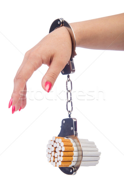 Addition concept with cigarettes and handcuffs Stock photo © Elnur