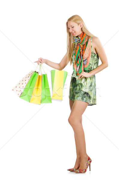 Stock photo: Woman after shopping spree on white