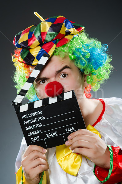 Clown with the movie board Stock photo © Elnur