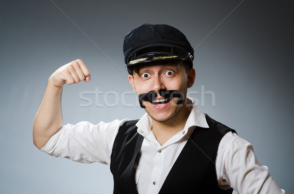 Funny taxi driver wearing peaked cap Stock photo © Elnur