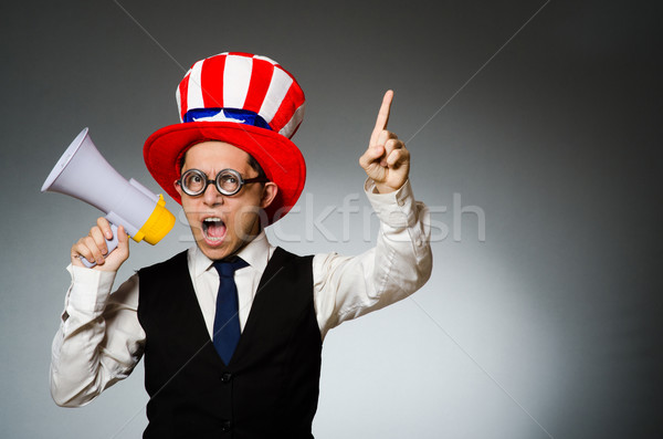 Stockfoto: Man · luidspreker · amerikaanse · hoed · business