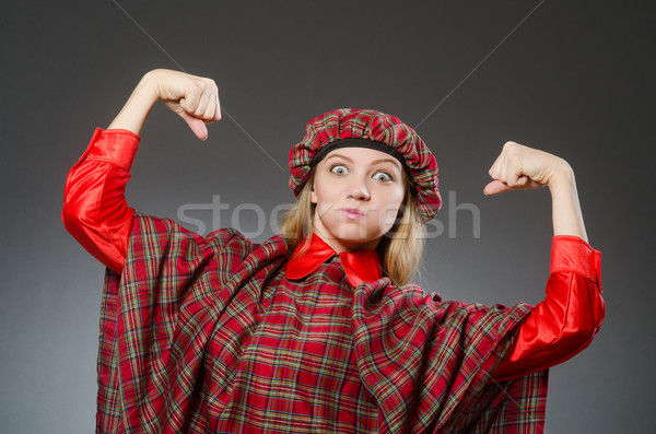 Woman wearing traditional scottish clothing Stock photo © Elnur