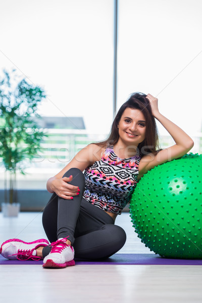 Young woman exercising with swiss ball in health concept Stock photo © Elnur