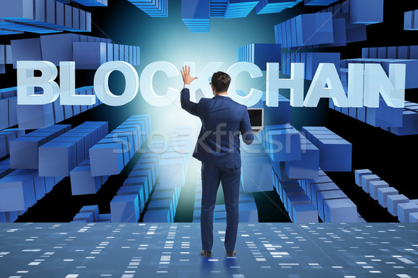 Businessman in blockchain cryptocurrency concept Stock photo © Elnur