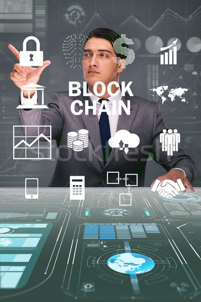 Businessman in blockchain cryptocurrency concept Stock photo © Elnur