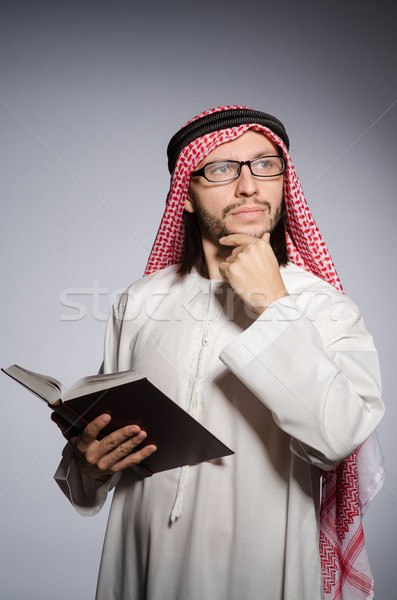 Arab man with book in diversity concept Stock photo © Elnur