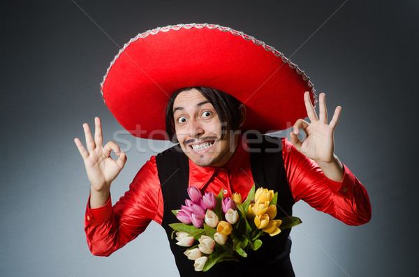Személy visel szombréró kalap vicces virágok Stock fotó © Elnur