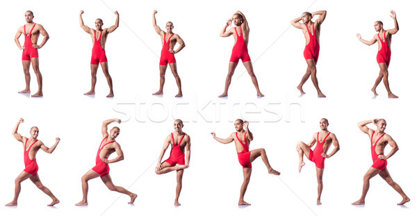 Stock photo: The young wrestler isolated on the white