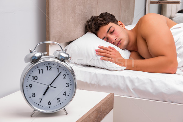 Man having trouble waking up in the morning Stock photo © Elnur