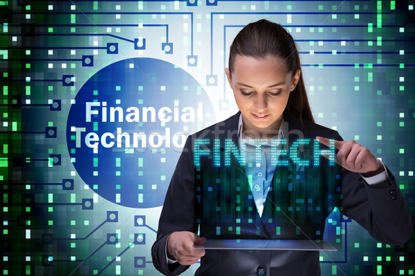 Businesswoman with tablet in financial technology fintech concep Stock photo © Elnur