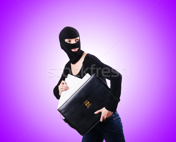 Industrial espionage concept with person in balaclava Stock photo © Elnur