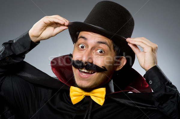 Funny magician man wearing tophat Stock photo © Elnur