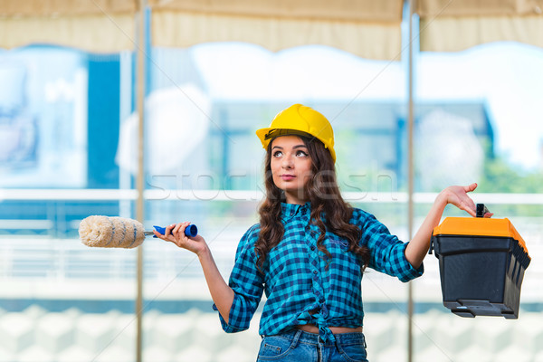 Young woman doing home improvements Stock photo © Elnur