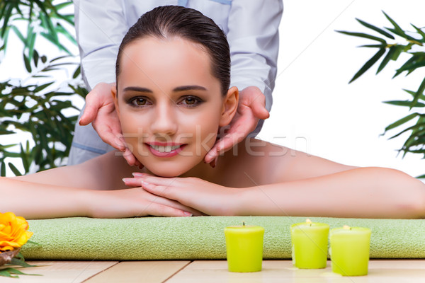 The woman during massage session in spa salon Stock photo © Elnur