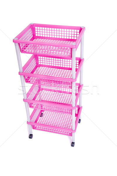 Pink bin rack shelf with wheels isolated on white Stock photo © Elnur