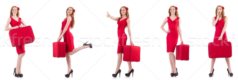 Stock photo: Young woman in red dress with suitcase isolated on white