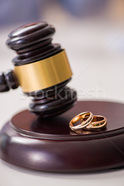 Stock photo: Judge gavel deciding on marriage divorce