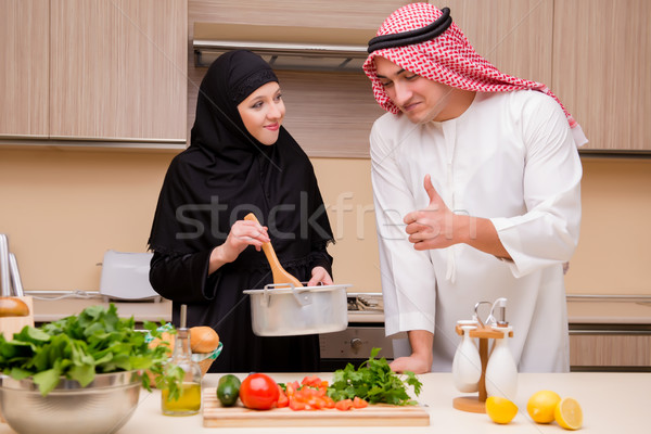 Young arab family in the kitchen Stock photo © Elnur