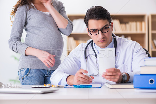 Pregnant woman visiting doctor for consultation Stock photo © Elnur