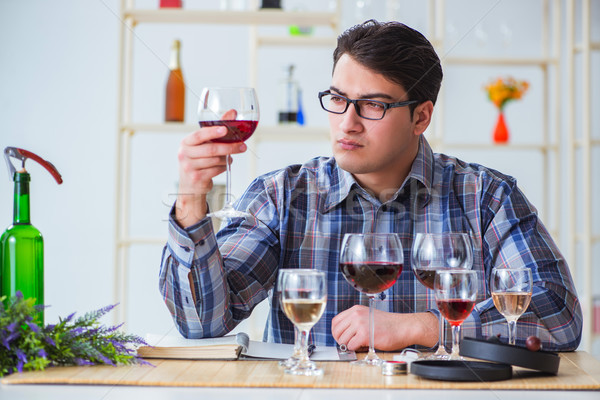 The professional sommelier tasting red wine  Stock photo © Elnur