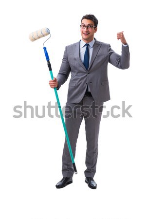 Young businessman holding a tool isolated on white Stock photo © Elnur