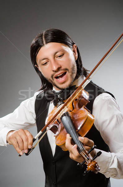 Musician plays cello isolated on white Stock photo © Elnur