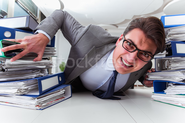 Businessman under stress due to excessive work Stock photo © Elnur