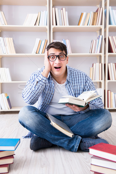 Young student studying with books Stock photo © Elnur